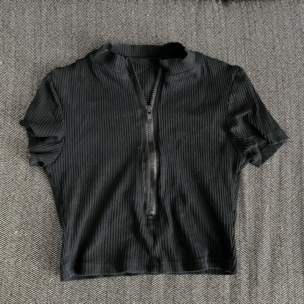 Black crop top, one size fits all but fits like a size S.